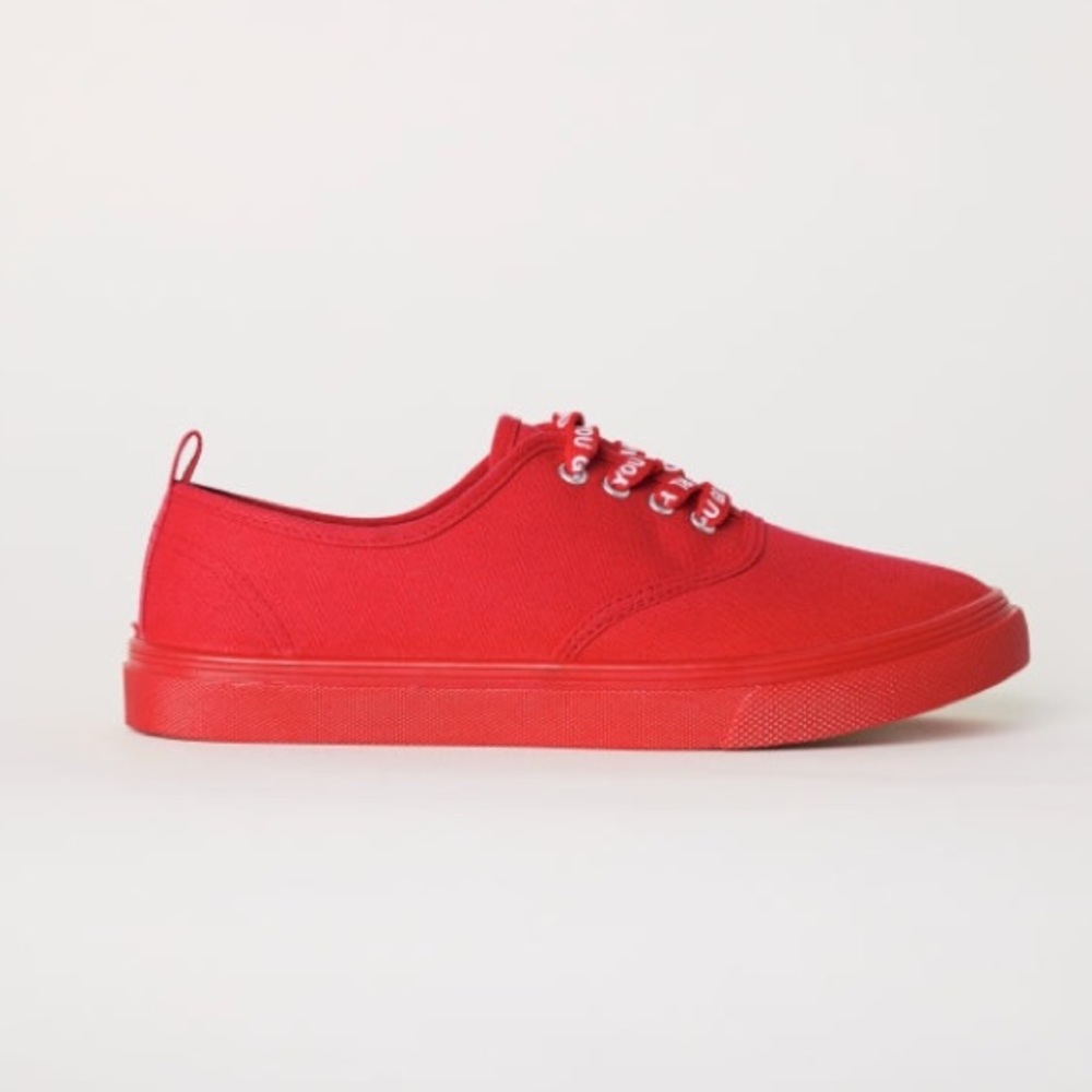 Red “go girl” sneakers